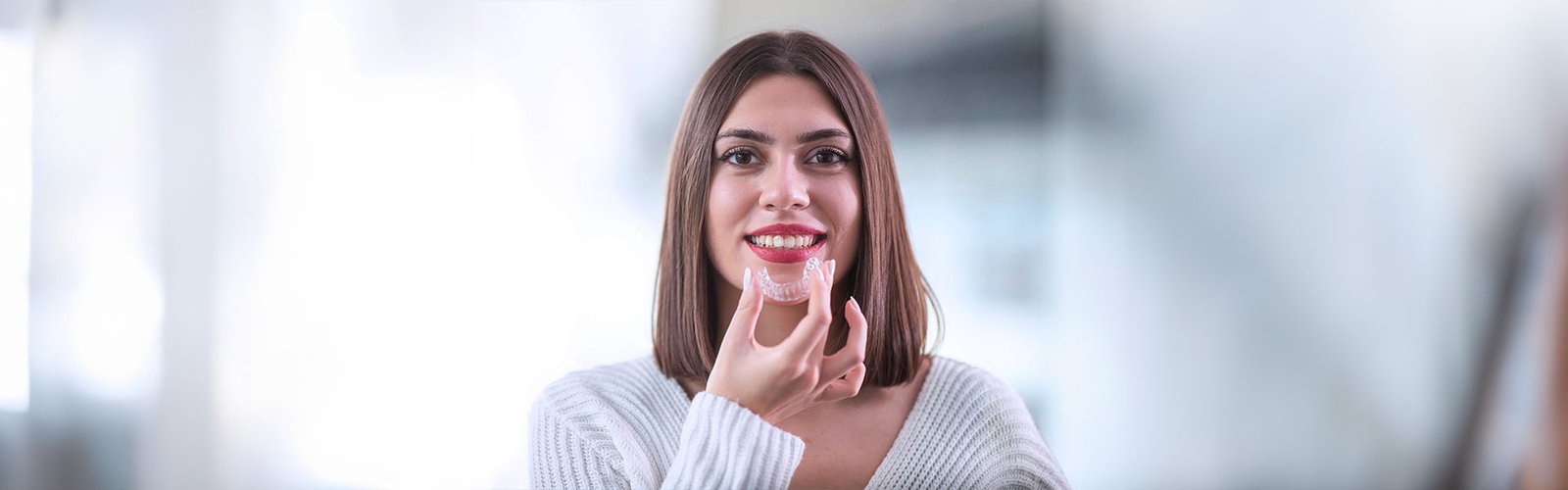 Say Goodbye to Crooked Teeth: Discover the Benefits of Invisalign from a Dentist Near You